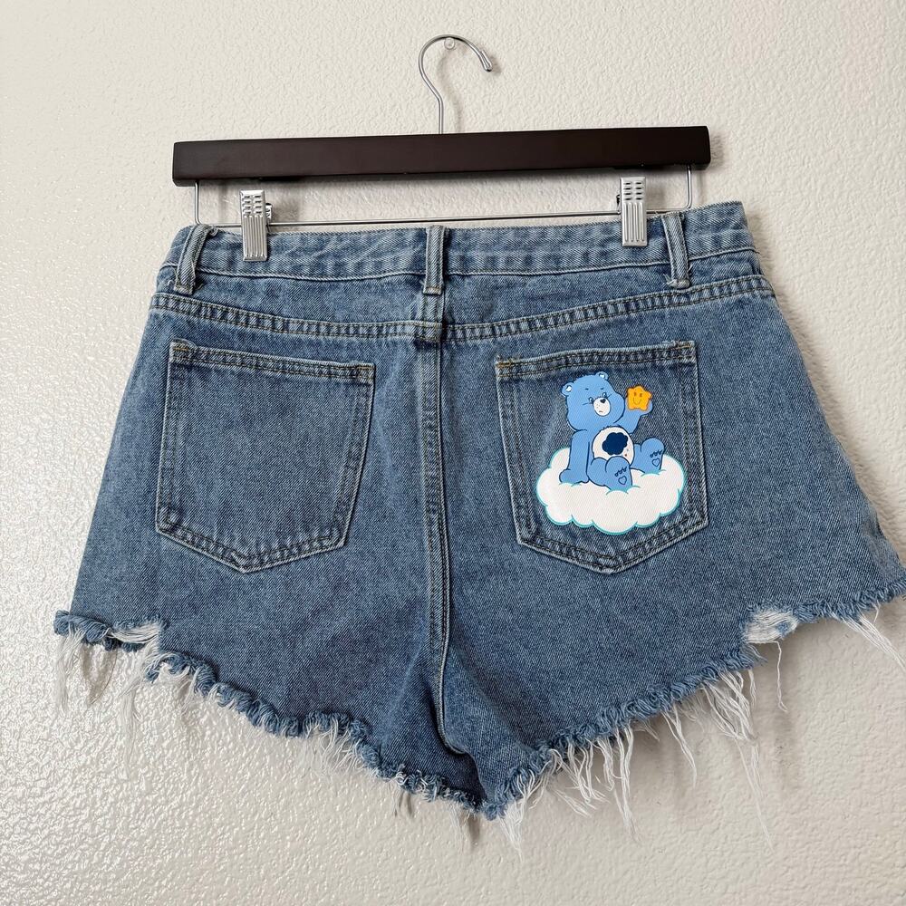 SHEIN x Care Bears distressed cutoff denim shorts grumpy bear